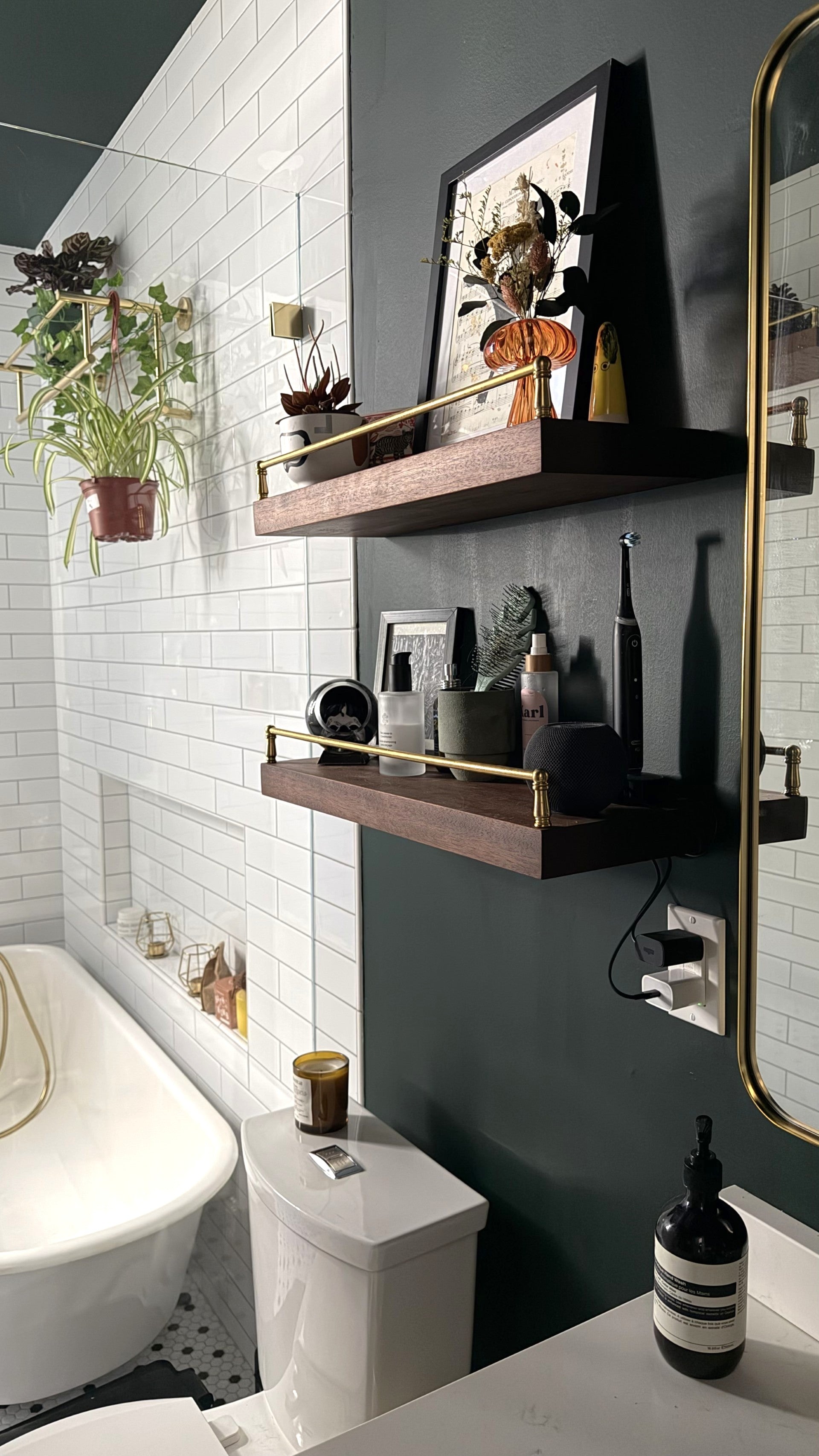 Solid mahogany floating shelf with gallery rail, showcasing natural wood grain and sturdy wall mounting for decor or display.