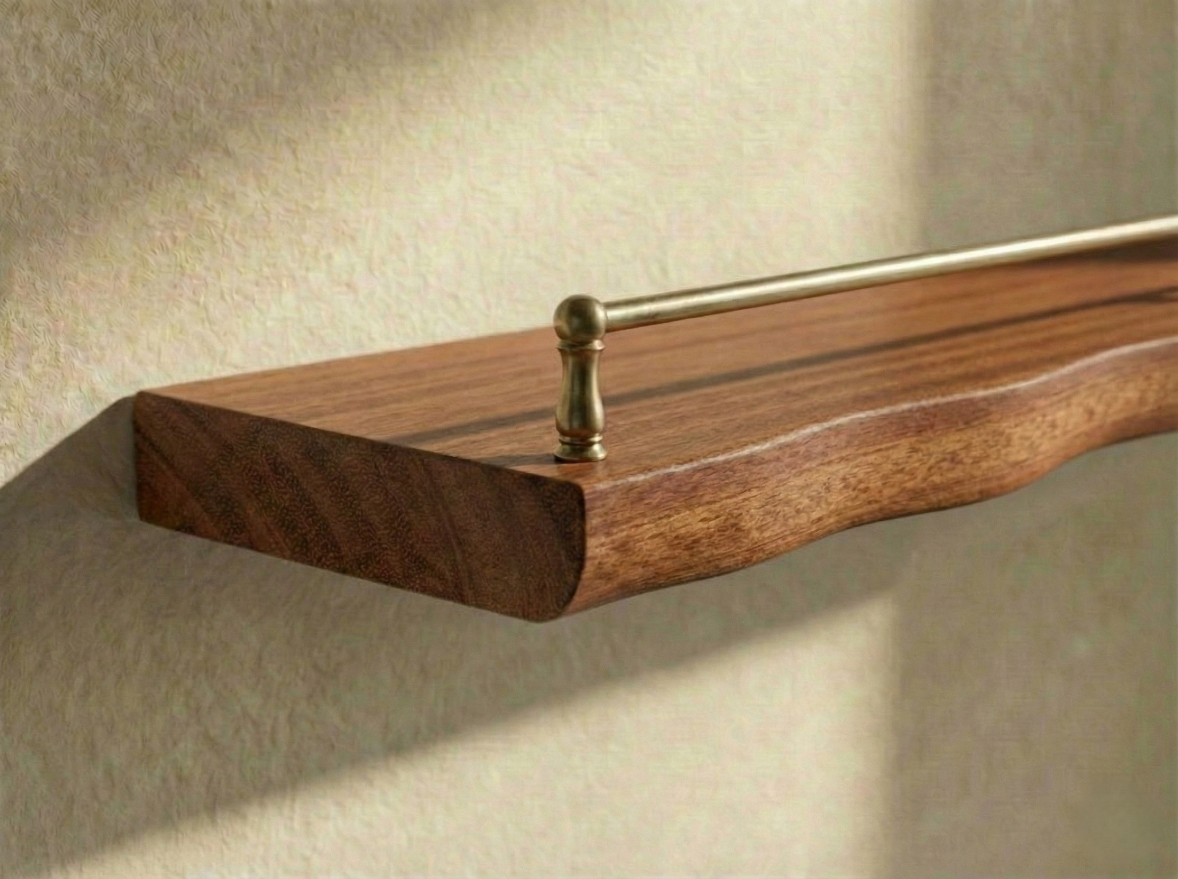 Solid mahogany live edge wall shelf with gallery rail, featuring natural wood grain and sturdy design for stylish storage.