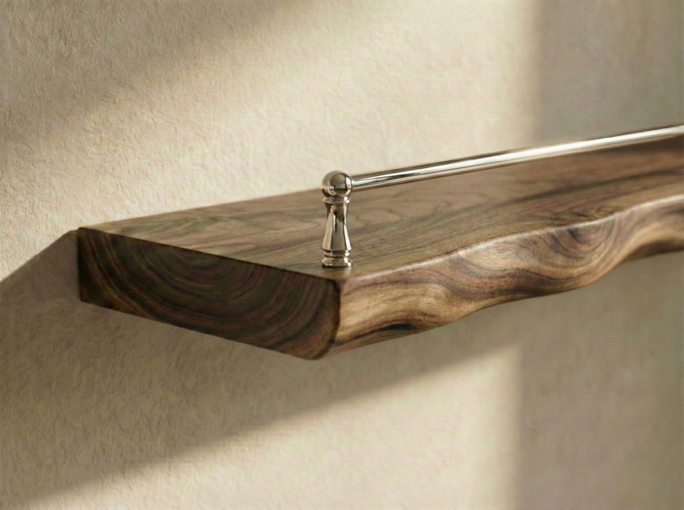 Solid walnut floating shelf with live edge and gallery rail, crafted by The Mortise & The Hare, showcasing natural wood grain and design.