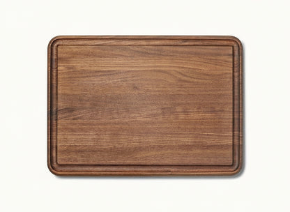 Wooden cutting board on a white background