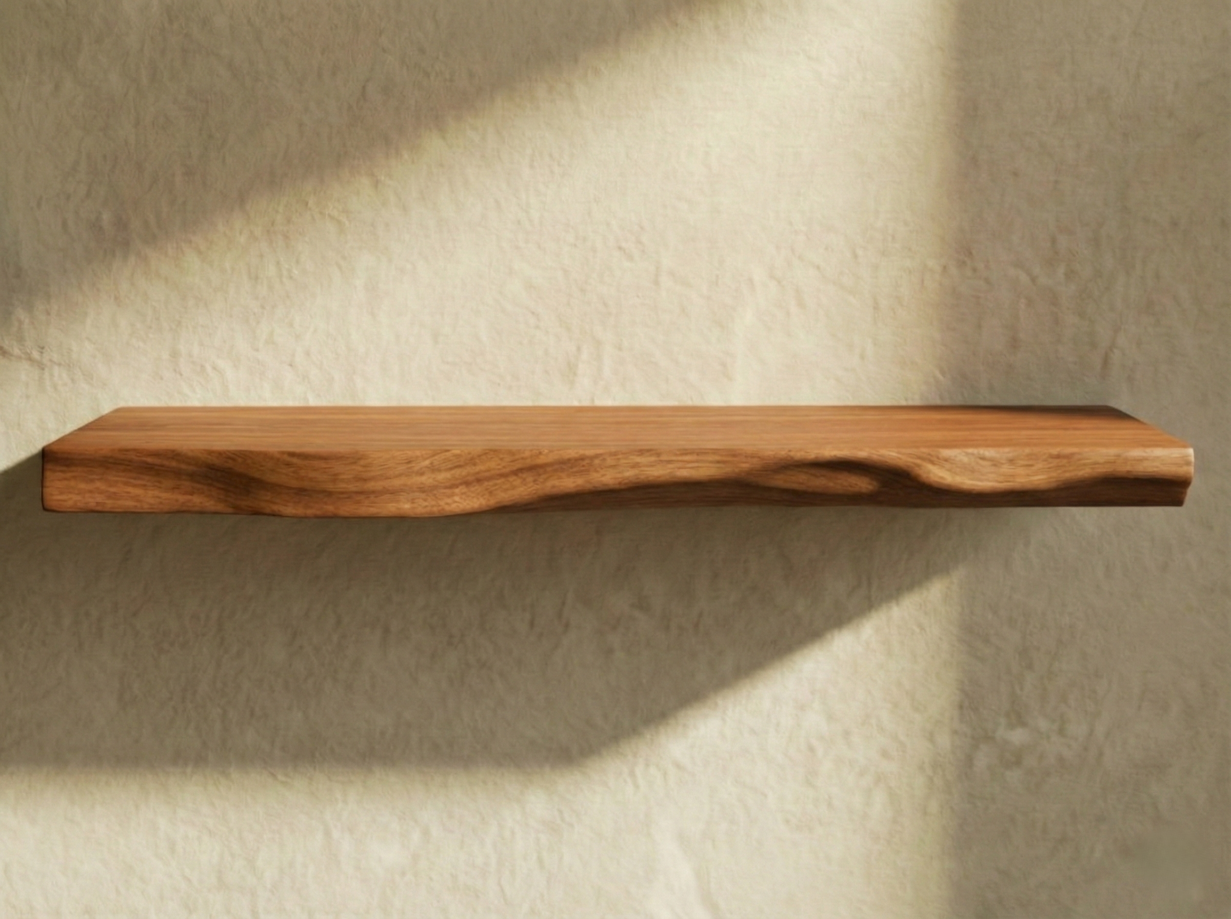 Solid mahogany live edge floating shelf showcasing natural wood grain and unique edge details for rustic home decor.