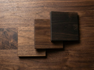 Walnut hardwood sample from The Mortise & The Hare showcasing rich brown color and natural wood grain texture.