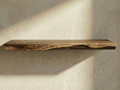 Solid walnut live edge floating shelf showcasing natural grain and unique contours, perfect for rustic home decor.