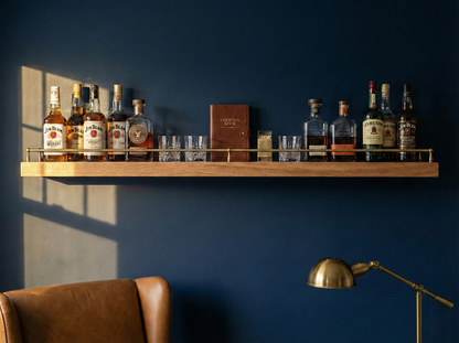 Solid red oak floating shelf with gallery rail, showcasing a sleek design and natural wood grain, ideal for wall display.